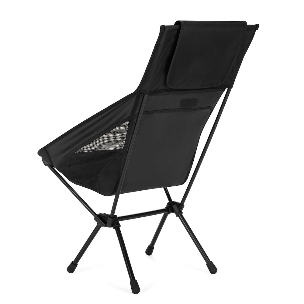 Helinox Sunset Chair zwarte kampeerstoel, zijaanzicht toont de rugleuning en stoelpootconstructie
